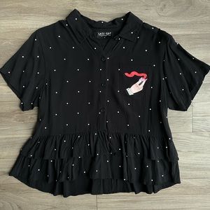 lazy oaf polka dot blouse with ruffles, buttons, and small graphic